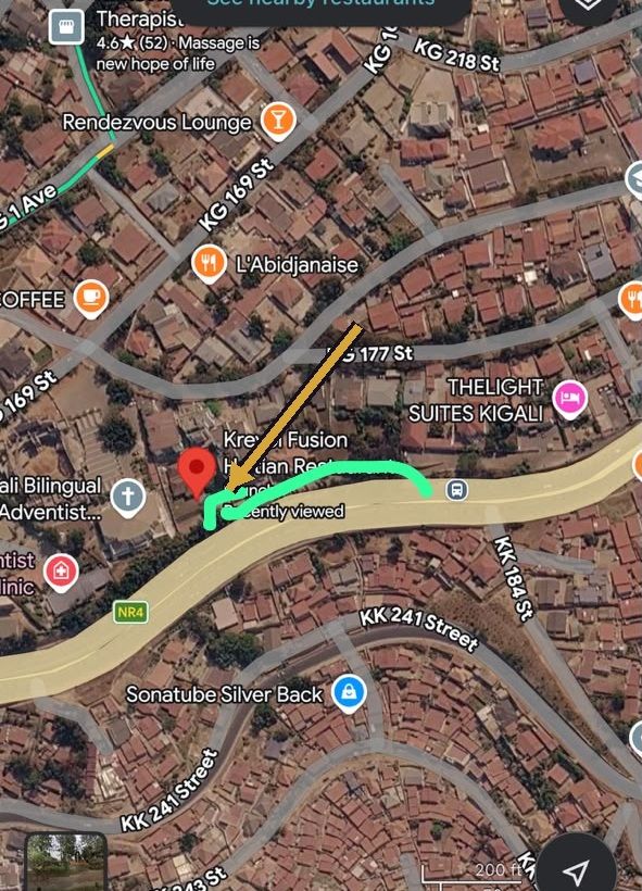 Satellite map of NR4 in Remera with an arrow and a drawn route showing the turn-in to Kreyol Fusion on the bend
